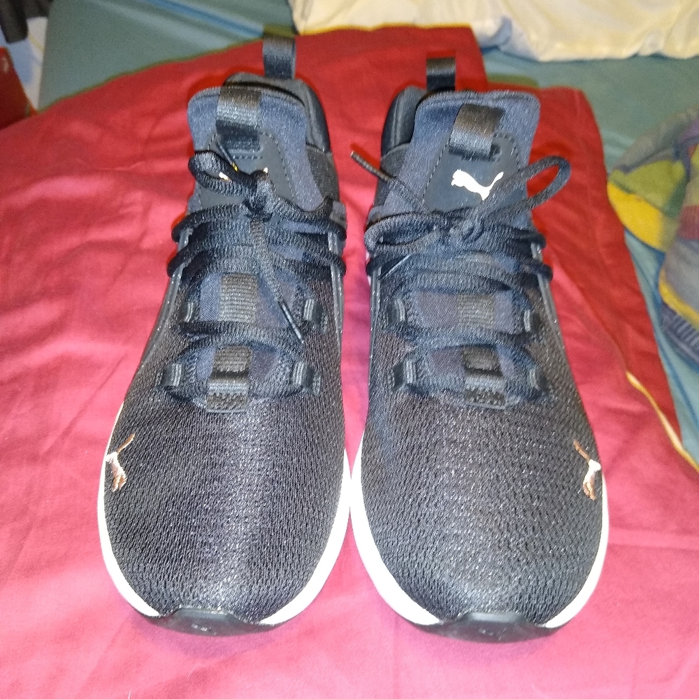 Women's puma enzo nxt athletic shoes, size 10.5, black with pink accents.